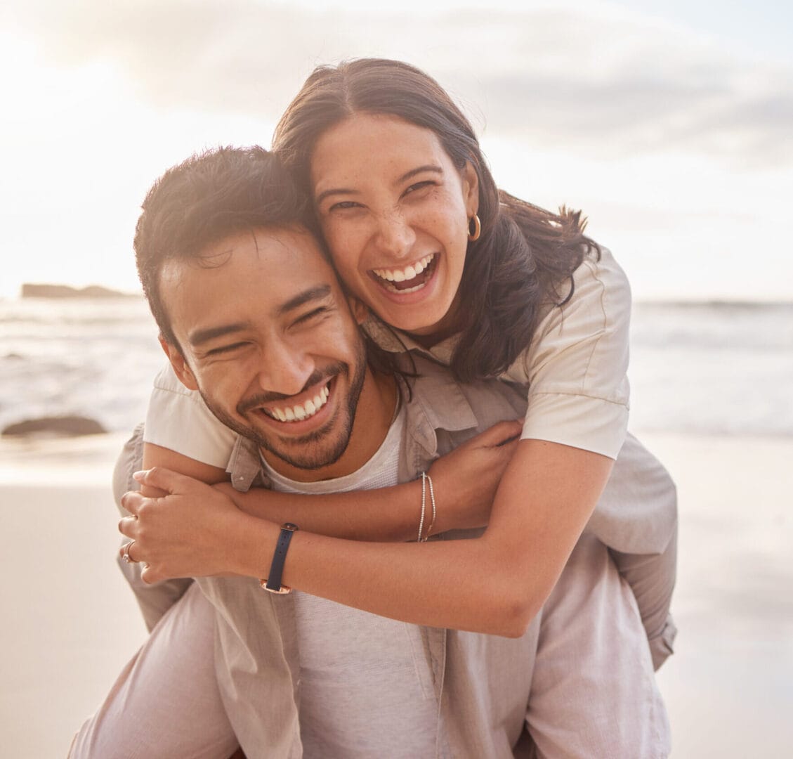 Happy couple on the beach
