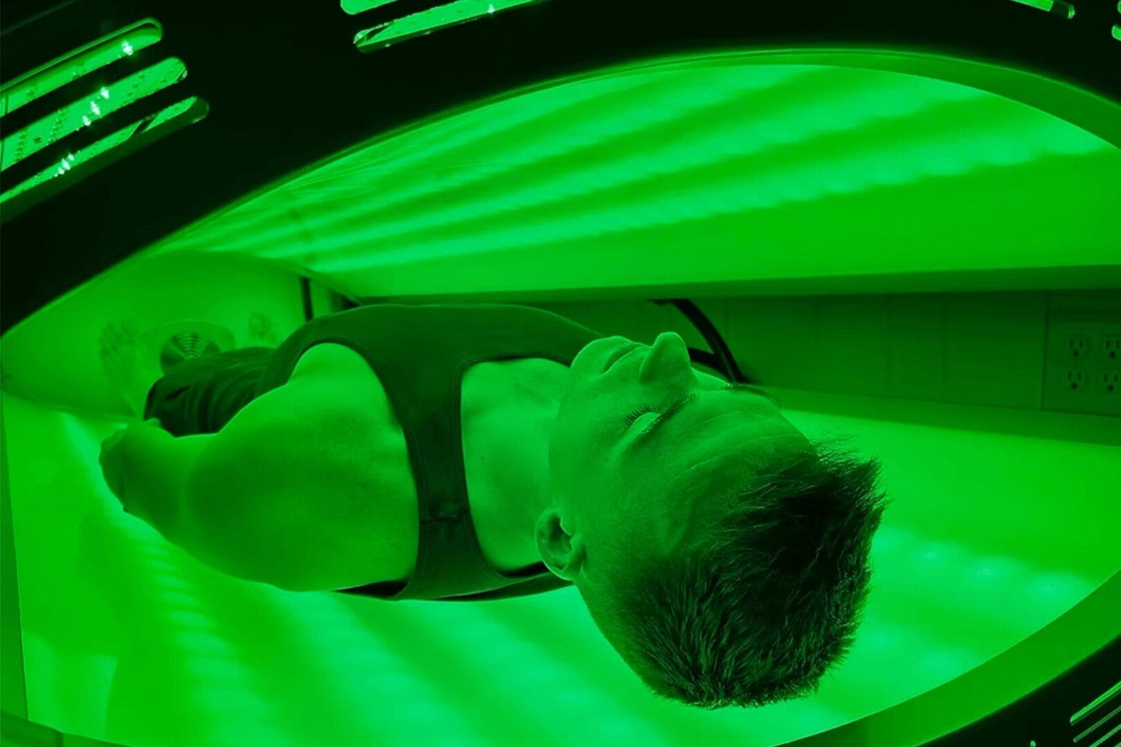 Lumati PBM bed with green light for wellness